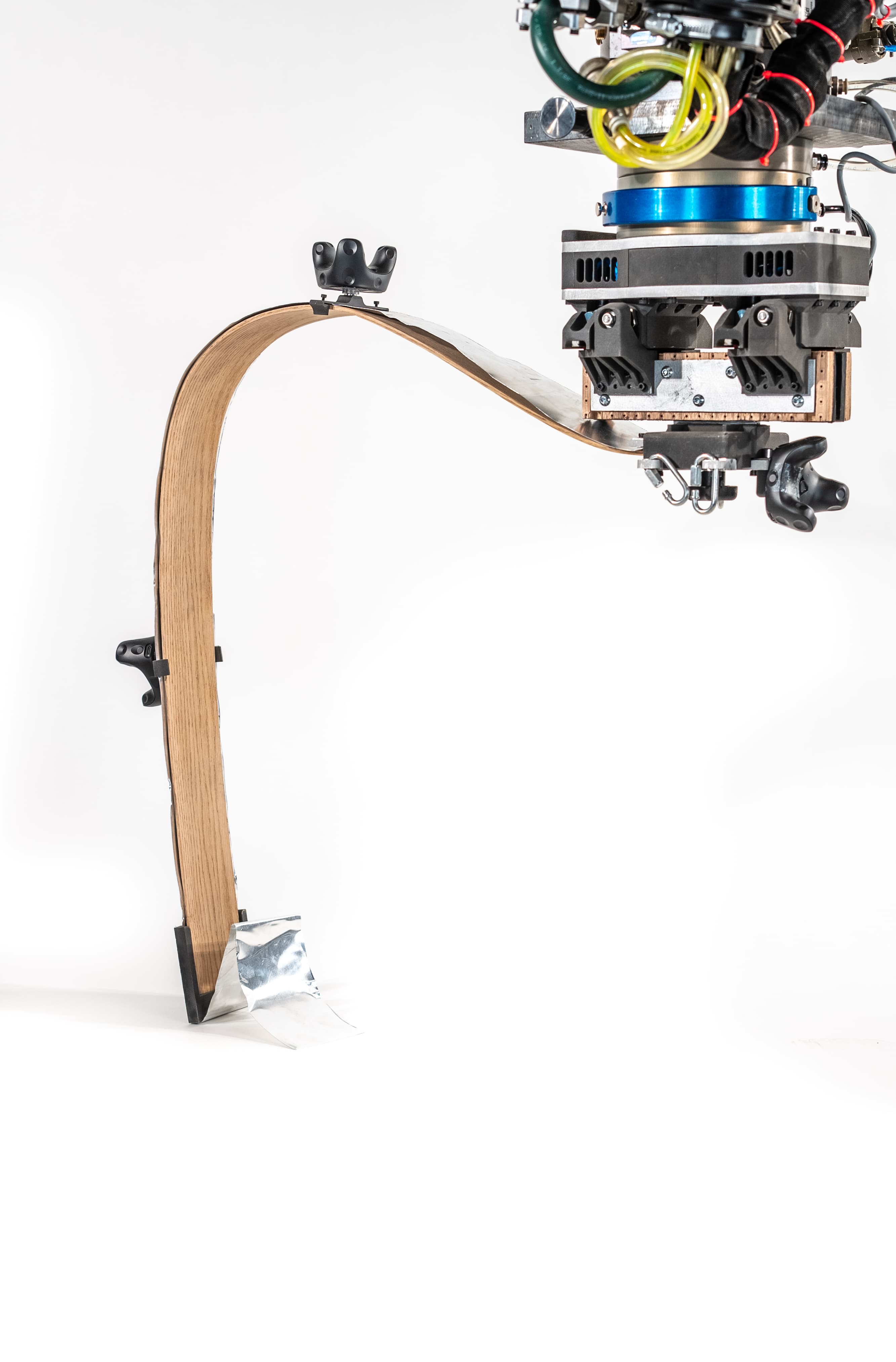 Compression strap integrated with robotic steam bending