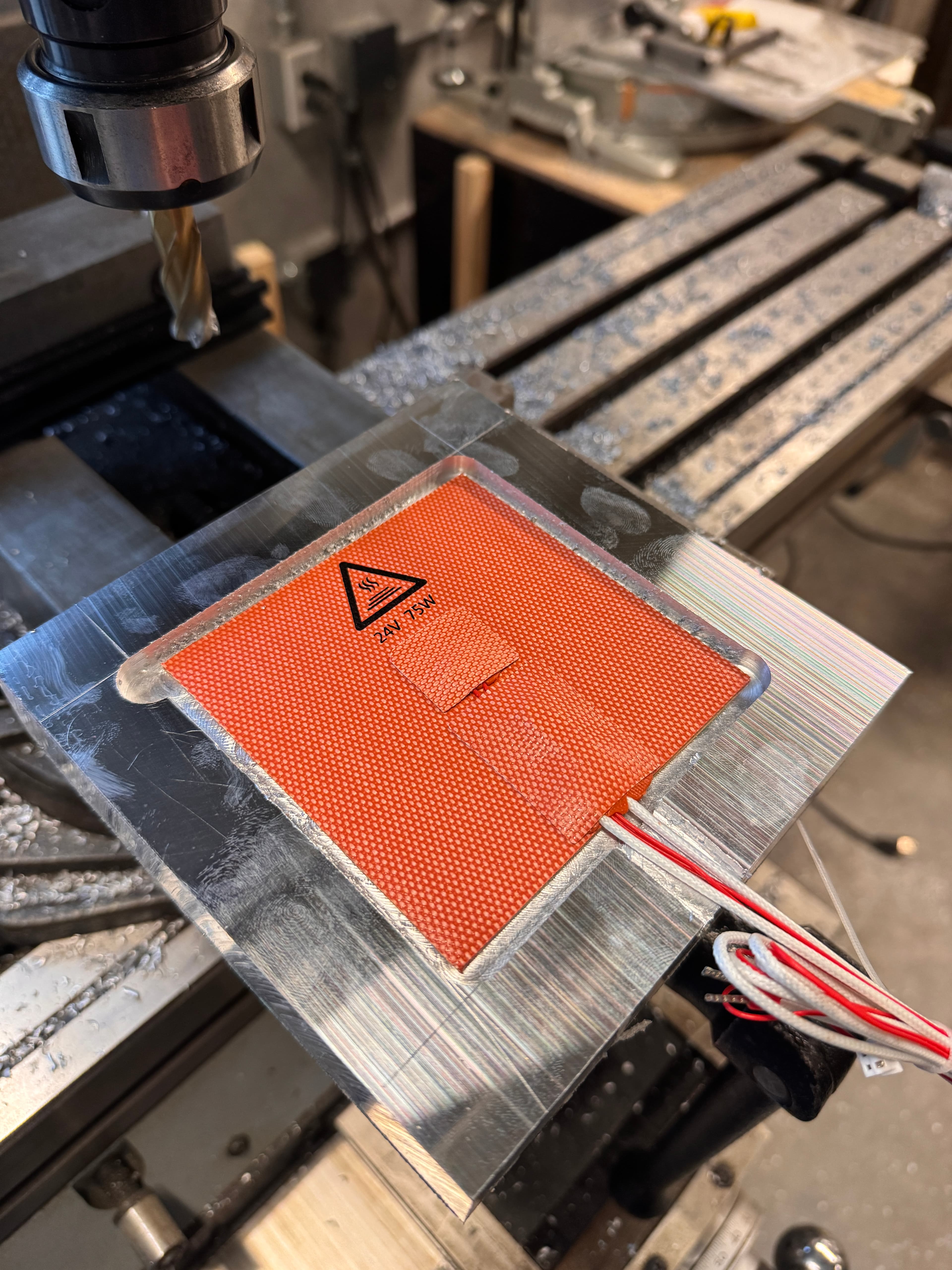 Milled aluminum platen showing the recessed heating element pocket